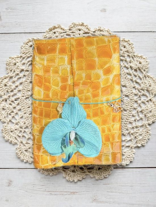 amber croc-embossed journal with turquoise orchid and gold charms