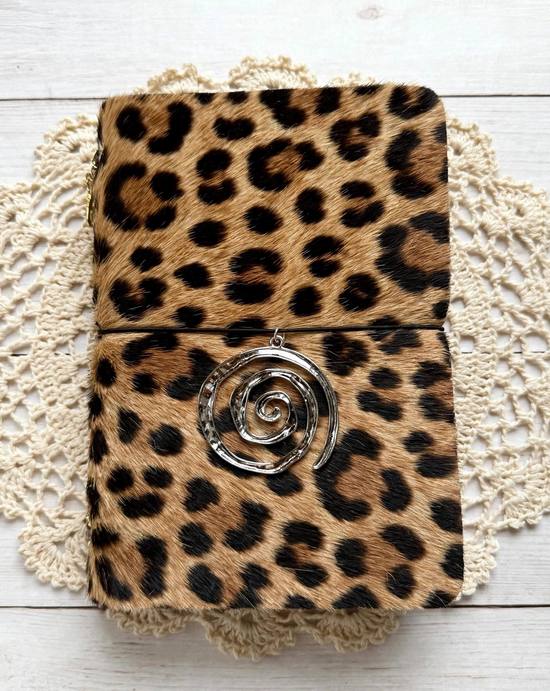 cheetah print journal with black elastic and silver spiral charm