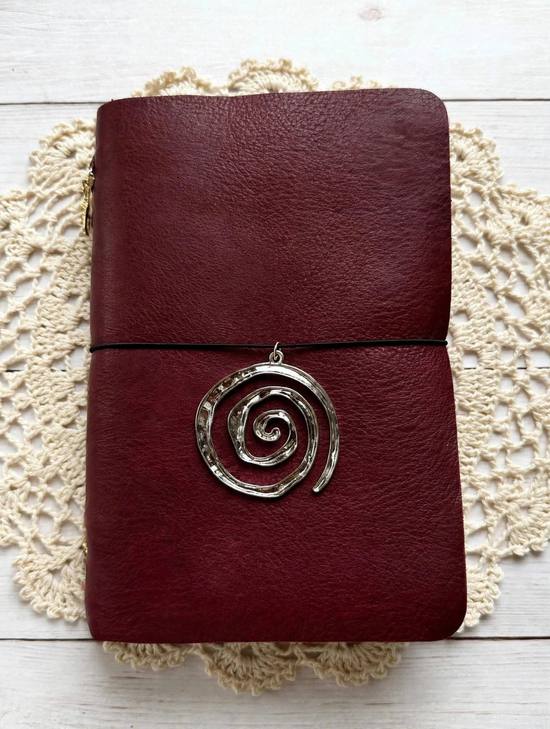 Merlot burgundy leather journal with black elastic and silver spiral charm